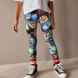 NEXT girls Black Graffiti Character Printed Leggings Size 11Y NWOT